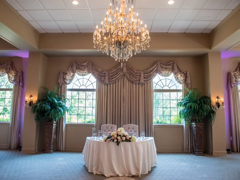 A shot of the bride's and groom's table at the wedding reception