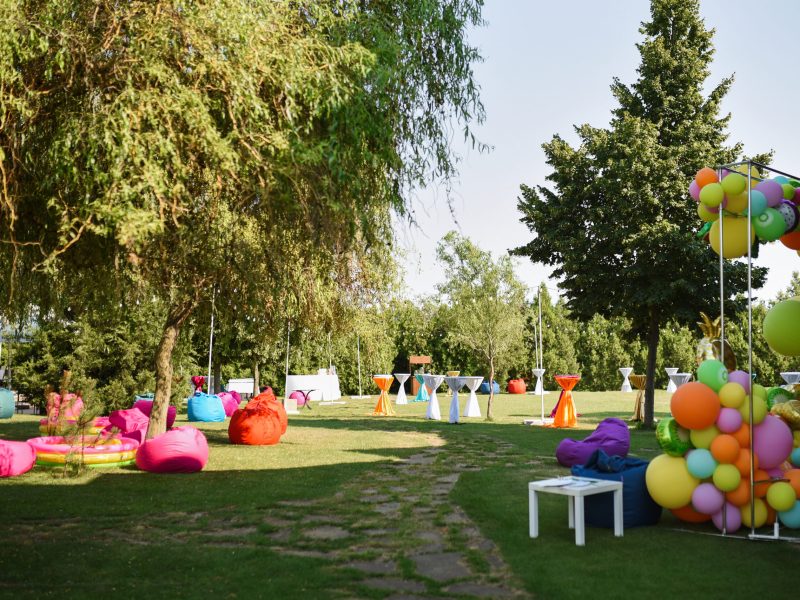 colorful, inflatable, soft seating areas on the lawn before the party