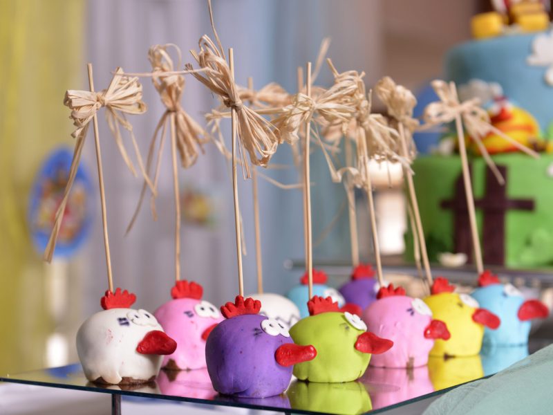 Tasty cupcakes on a white wooden table